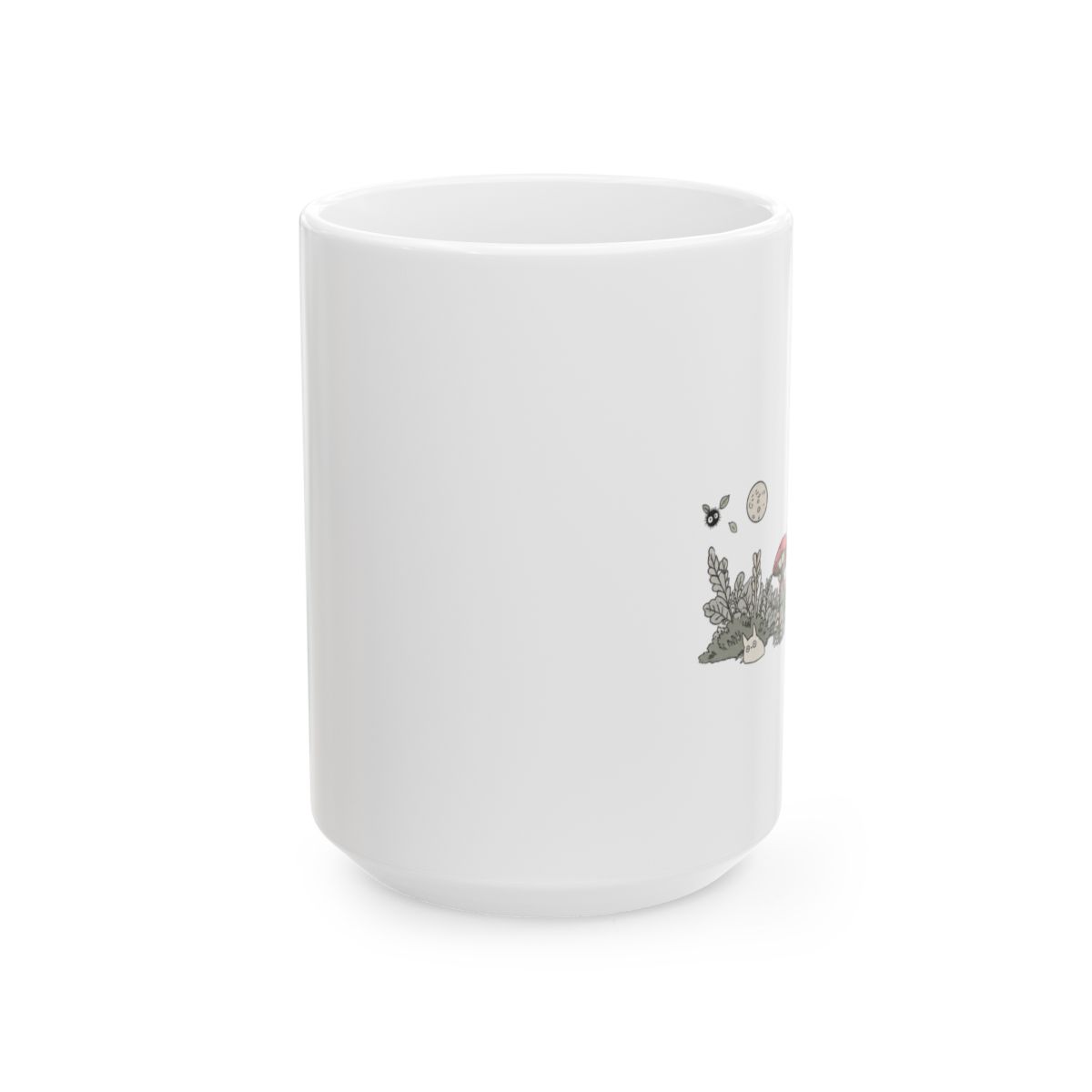 Black ceramic mug with a tan base and a black handle. The mug features a graphic of a character from the animated film "My Neighbour Totoro" with a rainy scene. The mug is on a neutral surface - alternate angle 1, merchandise
